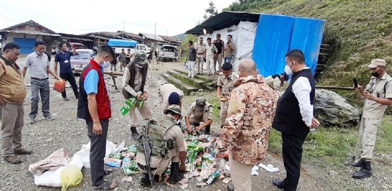Cigarettes and other tobacco products seized during the raid conducted by Police and administration in Satakha town on July 9. All seized items were destroyed in the presence of stakeholders. Shopkeepers have also been warned that selling of the banned substances will be penalised as per relevant sections of law. (DIPR Photo) 